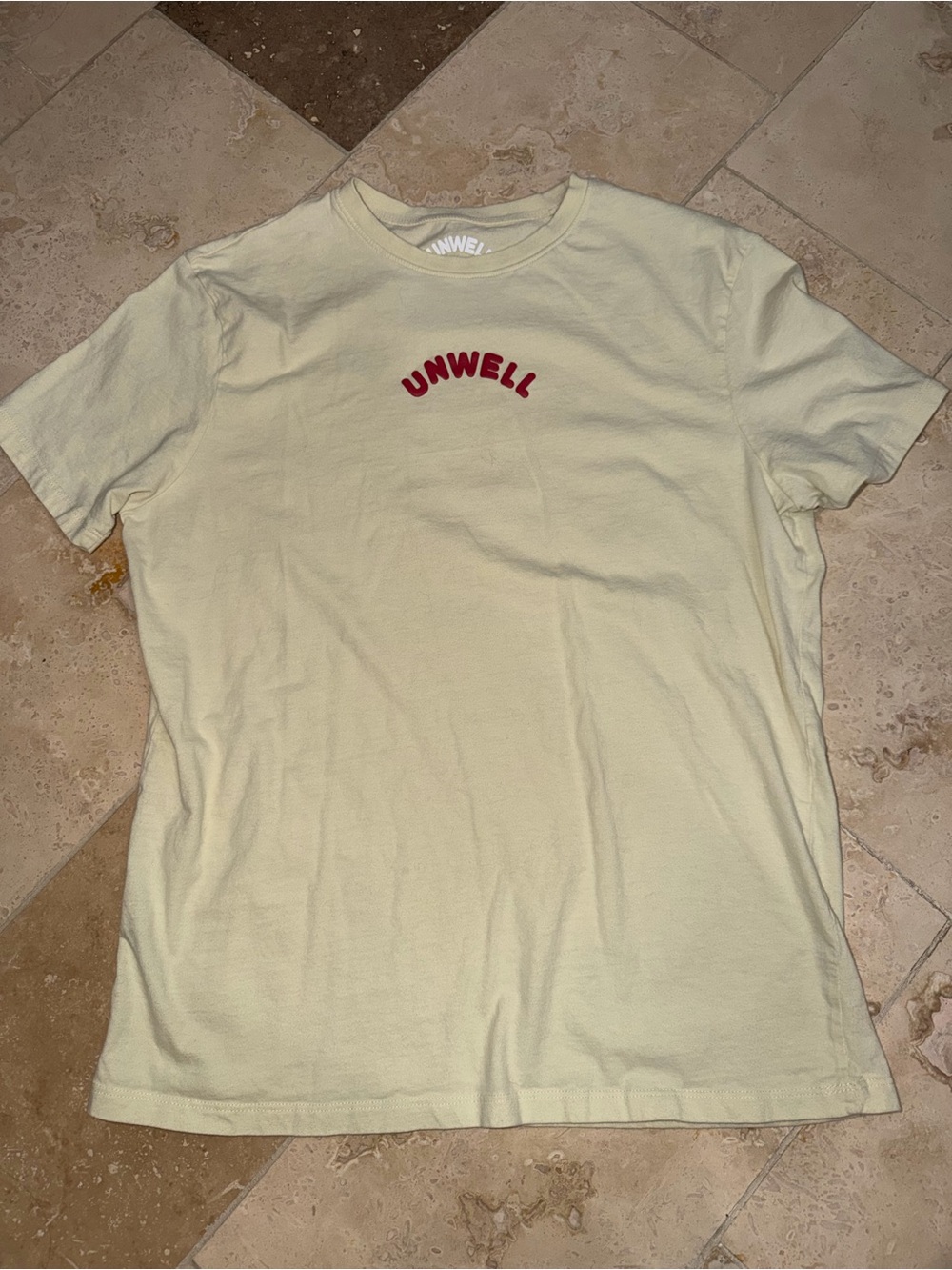 Unwell Women's Short Sleeve Tee in Pale Yellow with Red Logo